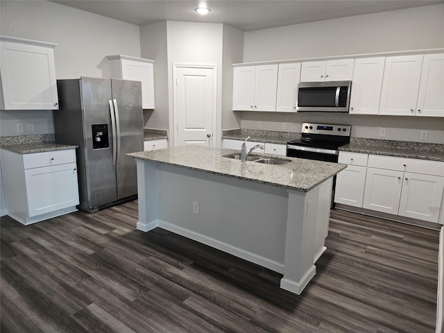 6310 Tropicana Ln, Forney, TX 75126 - kitchen featuring appliances with stainless steel finishes, a sink, dark wood-style flooring, white cabinets, and recessed lighting