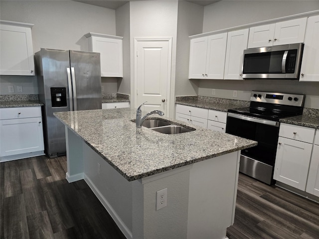 6310 Tropicana Ln, Forney, TX 75126 - kitchen featuring stainless steel appliances, a sink, dark wood-style flooring, and white cabinets