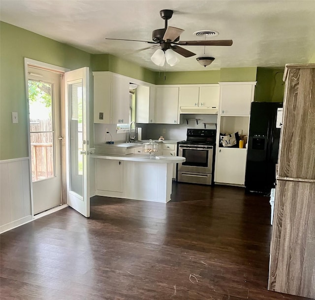 2142 Woodard St, Abilene, TX 79605 - kitchen with electric range, black fridge, a peninsula, a sink, and ceiling fan