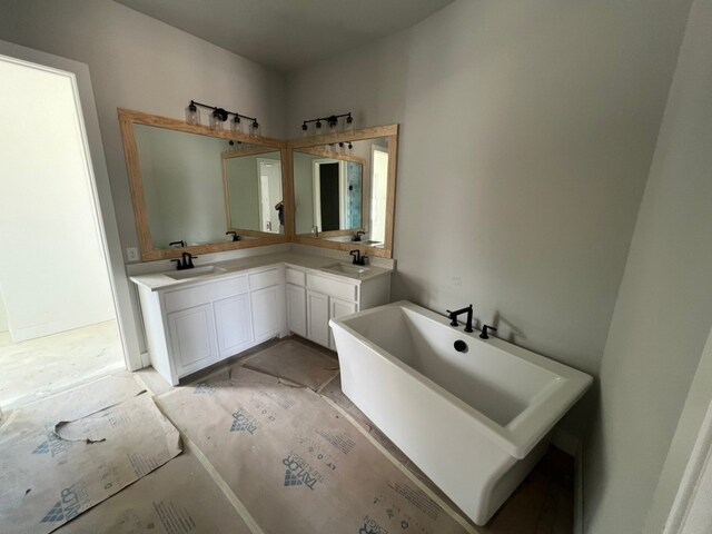317 Magnolia Ln, Westworth Village, TX 76114 - full bathroom featuring a freestanding tub and double vanity