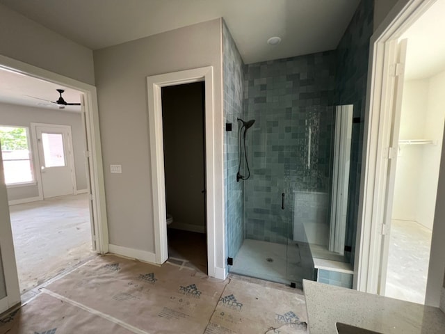 317 Magnolia Ln, Westworth Village, TX 76114 - bathroom with a shower stall, toilet, and a ceiling fan
