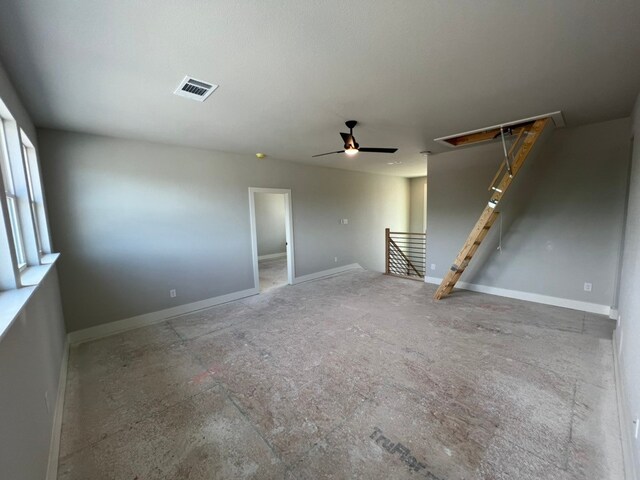 317 Magnolia Ln, Westworth Village, TX 76114 - empty room with attic access, ceiling fan, and baseboards