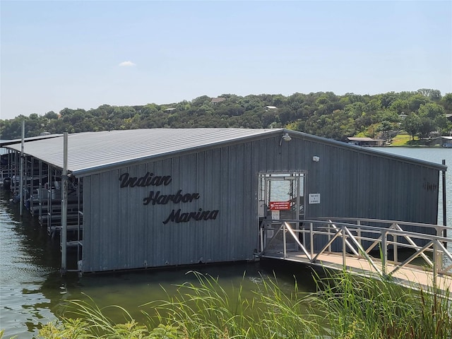 view of outbuilding featuring a water view