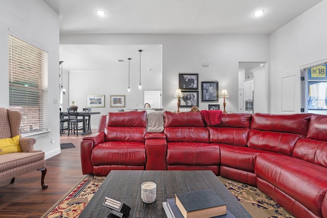 living area featuring wood finished floors, recessed lighting, and baseboards