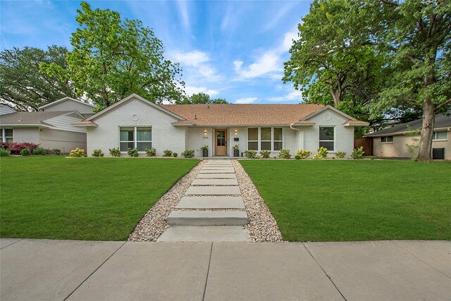 3314 Norcross Ln, Dallas, TX 75229 - single story home with a front yard and brick siding