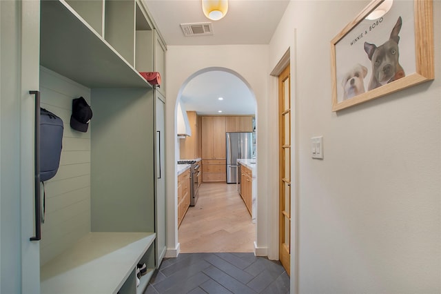 3314 Norcross Ln, Dallas, TX 75229 - mudroom with arched walkways, recessed lighting, and tile patterned flooring