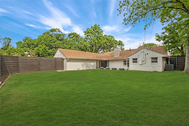 3314 Norcross Ln, Dallas, TX 75229 - back of house featuring a chimney, brick siding, and central AC unit