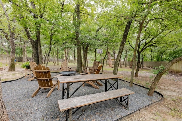 109 Mariah Dr, Weatherford, TX 76087 - view of patio / terrace featuring a fire pit and fence