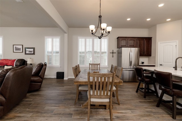 1705 Surrey Ct, Weatherford, TX 76087 - dining room with a chandelier, dark wood finished floors, recessed lighting, and baseboards
