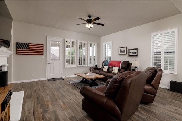 1705 Surrey Ct, Weatherford, TX 76087 - living room with ceiling fan, dark wood-type flooring, and healthy amount of natural light