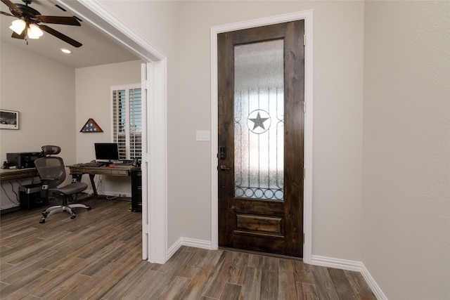 1705 Surrey Ct, Weatherford, TX 76087 - entryway with wood finished floors, a ceiling fan, and baseboards