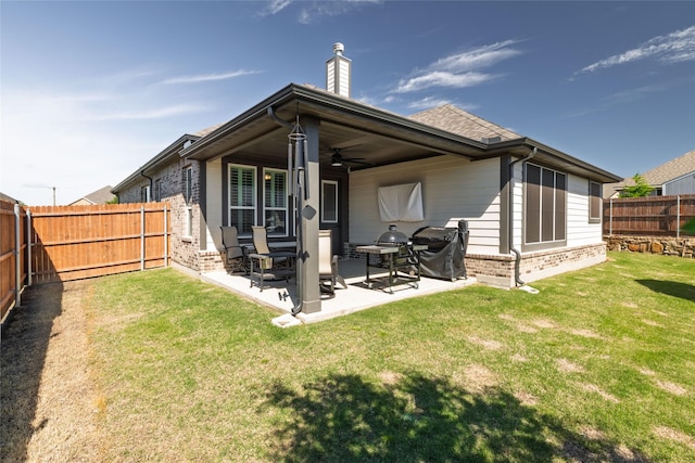 1705 Surrey Ct, Weatherford, TX 76087 - rear view of property featuring brick siding, a ceiling fan, a chimney, and a patio area