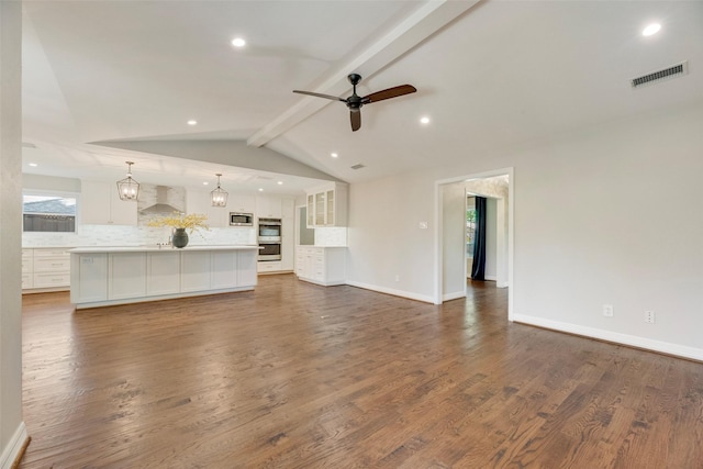 7324 Heathermore Dr, Dallas, TX 75248 - unfurnished living room with a ceiling fan, dark wood-style floors, baseboards, and recessed lighting