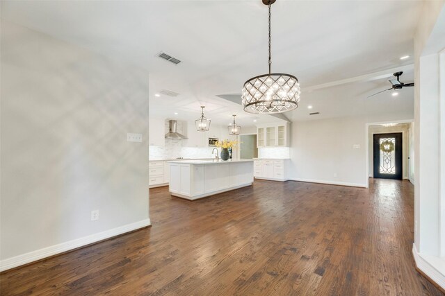 7324 Heathermore Dr, Dallas, TX 75248 - unfurnished living room with a chandelier, baseboards, recessed lighting, dark wood finished floors, and a sink
