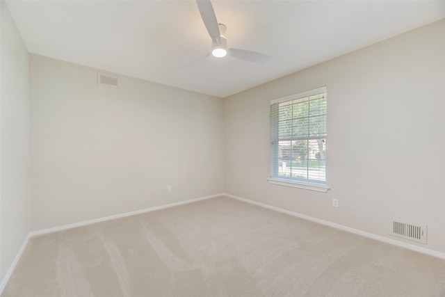7324 Heathermore Dr, Dallas, TX 75248 - unfurnished room with light colored carpet, ceiling fan, and baseboards