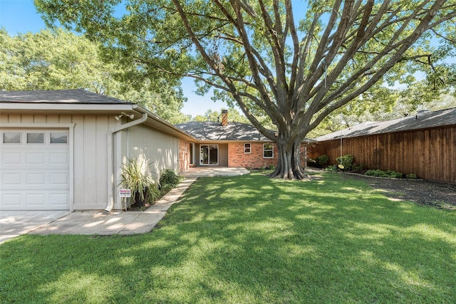 7324 Heathermore Dr, Dallas, TX 75248 - view of yard featuring an attached garage