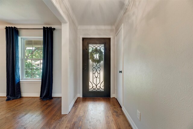 7324 Heathermore Dr, Dallas, TX 75248 - entryway featuring wood finished floors, ornamental molding, and baseboards