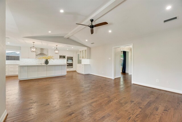 unfurnished living room with ceiling fan, light wood-style floors, recessed lighting, and baseboards