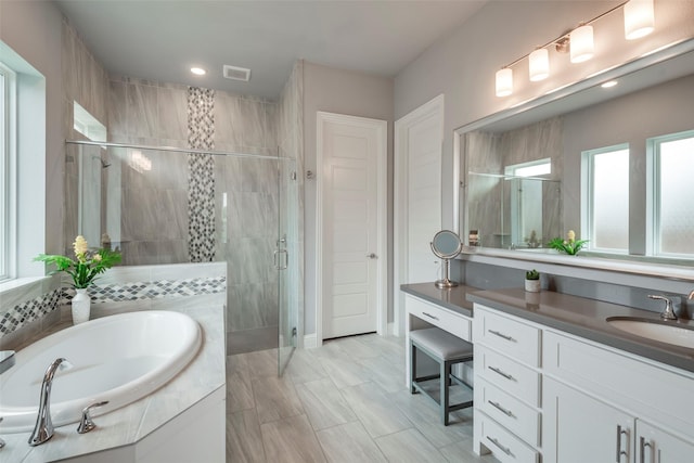 14312 Home Trl, Fort Worth, TX 76262 - bathroom with a shower stall, a garden tub, and vanity