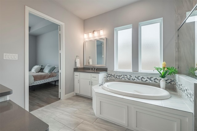 14312 Home Trl, Fort Worth, TX 76262 - full bathroom featuring a bath, vanity, and tiled shower