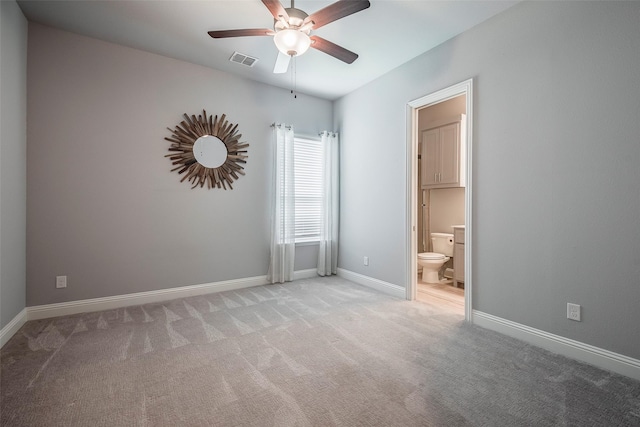 14312 Home Trl, Fort Worth, TX 76262 - unfurnished bedroom with light carpet, ensuite bathroom, baseboards, and ceiling fan