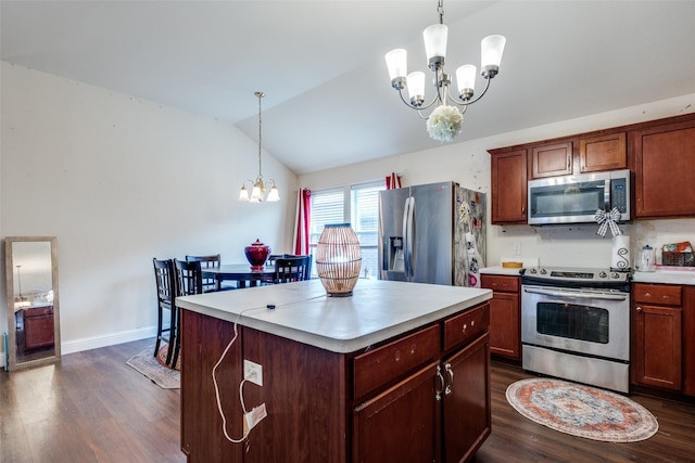 1727 Blacksmith Dr, Dallas, TX 75253 - kitchen with stainless steel appliances, a chandelier, dark wood-type flooring, light countertops, and decorative light fixtures