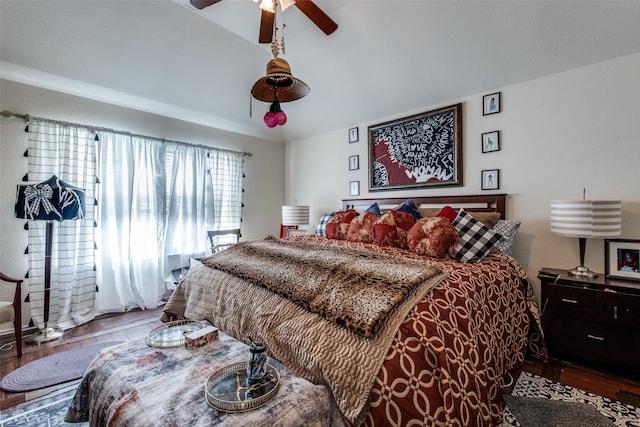 1727 Blacksmith Dr, Dallas, TX 75253 - bedroom with wood finished floors, lofted ceiling, and a ceiling fan