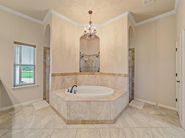129 Spring Meadow Dr, Springtown, TX 76082 - bathroom with tiled shower, a garden tub, ornamental molding, a chandelier, and baseboards