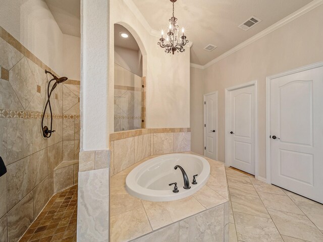 129 Spring Meadow Dr, Springtown, TX 76082 - bathroom with a tile shower, a garden tub, crown molding, and a chandelier
