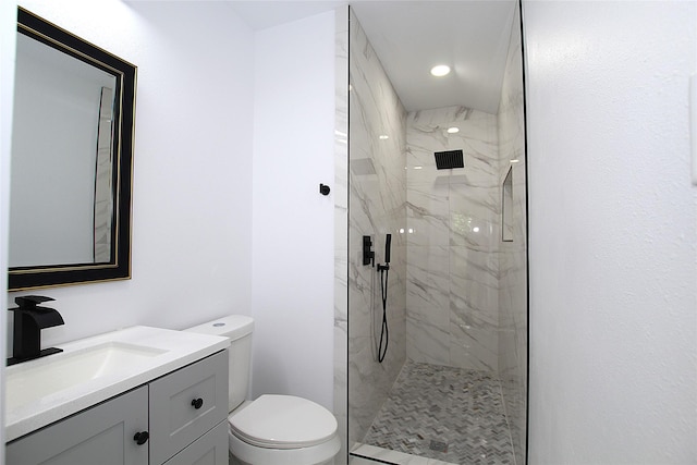 13308 Kempwood Ln, Dallas, TX 75253 - full bathroom with toilet, a marble finish shower, vanity, and recessed lighting