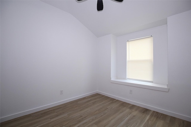 13308 Kempwood Ln, Dallas, TX 75253 - empty room featuring vaulted ceiling, wood finished floors, baseboards, and ceiling fan