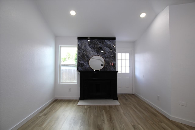13308 Kempwood Ln, Dallas, TX 75253 - foyer with plenty of natural light, wood finished floors, baseboards, a fireplace, and recessed lighting