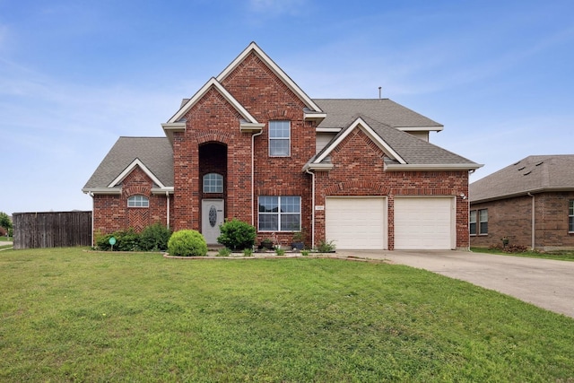1301 Taren Trl, Wylie, TX 75098 - traditional-style home with driveway, brick siding, roof with shingles, and a garage
