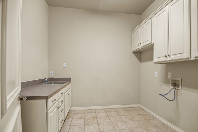 17 Wimbledon Ct, Heath, TX 75032 - laundry room with cabinet space, washer hookup, and baseboards