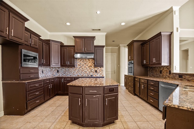 17 Wimbledon Ct, Heath, TX 75032 - kitchen featuring appliances with stainless steel finishes, under cabinet range hood, light tile patterned floors, dark brown cabinetry, and recessed lighting