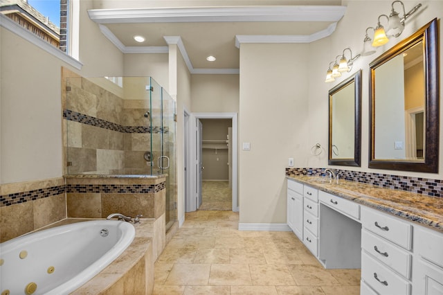 17 Wimbledon Ct, Heath, TX 75032 - bathroom featuring a stall shower, vanity, a whirlpool tub, crown molding, and decorative backsplash