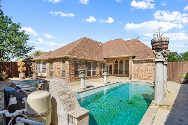 17 Wimbledon Ct, Heath, TX 75032 - view of pool featuring a patio, a fenced backyard, and a hot tub