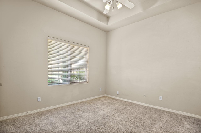 17 Wimbledon Ct, Heath, TX 75032 - spare room with carpet floors, ceiling fan, baseboards, and a raised ceiling