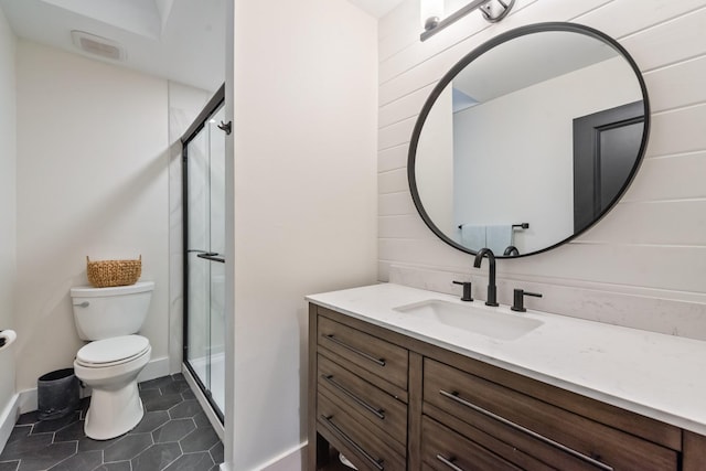 9 Southshore Cir, Star Harbor, TX 75148 - bathroom with toilet, a shower stall, vanity, tile patterned floors, and baseboards