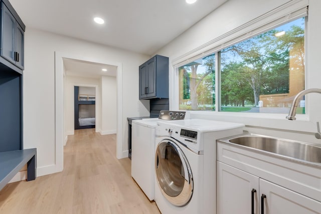9 Southshore Cir, Star Harbor, TX 75148 - laundry area featuring cabinet space, washer and clothes dryer, light wood-type flooring, recessed lighting, and baseboards