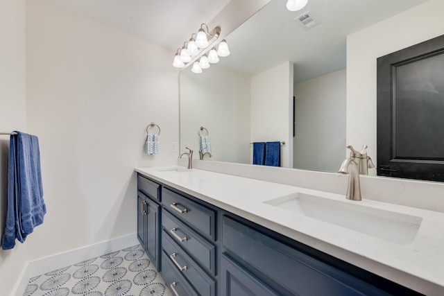 9 Southshore Cir, Star Harbor, TX 75148 - bathroom with baseboards, double vanity, and tile patterned flooring