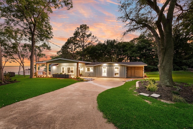 9 Southshore Cir, Star Harbor, TX 75148 - view of front of home featuring driveway and board and batten siding
