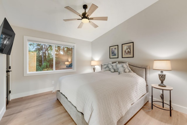 9 Southshore Cir, Star Harbor, TX 75148 - bedroom with light wood-type flooring, vaulted ceiling, baseboards, and a ceiling fan