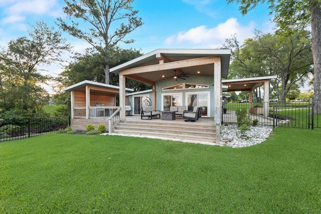 9 Southshore Cir, Star Harbor, TX 75148 - back of property with a ceiling fan, an outdoor hangout area, and a deck