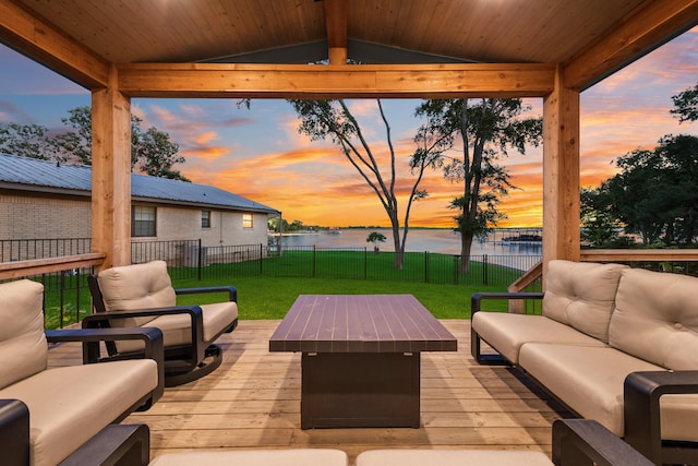 9 Southshore Cir, Star Harbor, TX 75148 - patio terrace at dusk featuring outdoor lounge area and a deck with water view