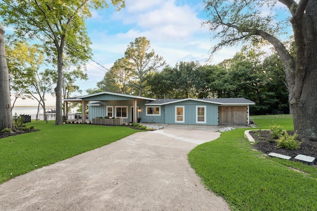 9 Southshore Cir, Star Harbor, TX 75148 - ranch-style house featuring concrete driveway and board and batten siding