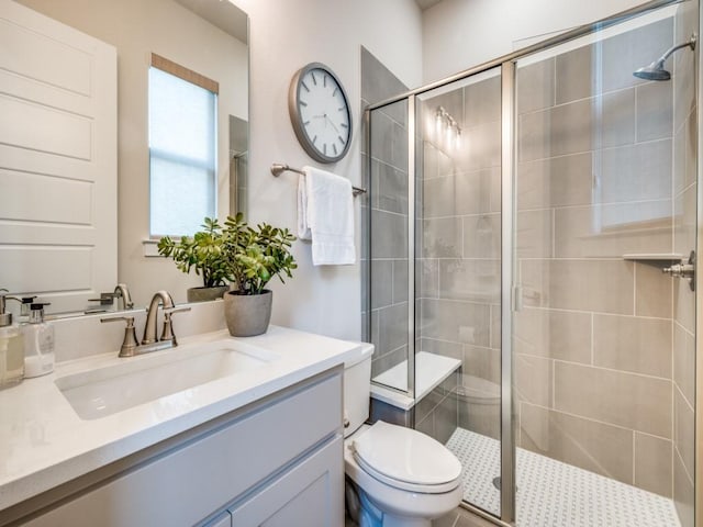 4208 Sunrise Ln, Celina, TX 75078 - bathroom featuring a shower stall, toilet, and vanity