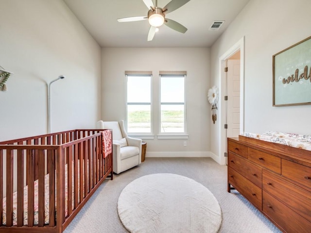 4208 Sunrise Ln, Celina, TX 75078 - bedroom featuring light carpet, baseboards, a crib, and ceiling fan