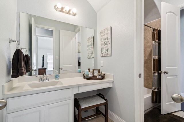804 Countryside Way, Little Elm, TX 76227 - full bathroom featuring vanity, shower / bath combo with shower curtain, a textured wall, and baseboards