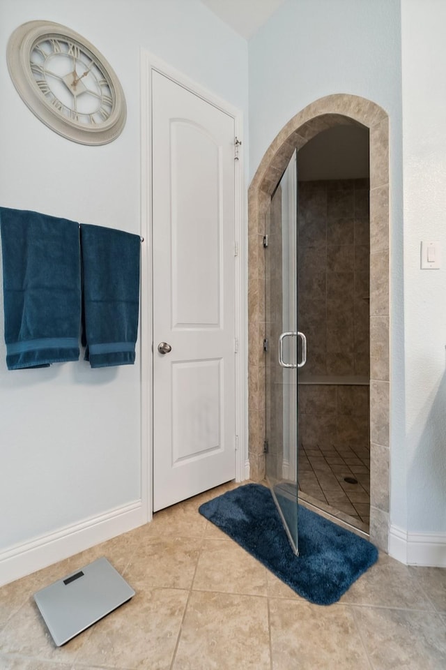 804 Countryside Way, Little Elm, TX 76227 - bathroom with a shower stall, baseboards, and tile patterned flooring
